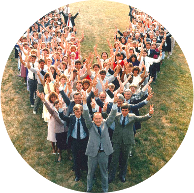 Vanguard employees standing in a V formation